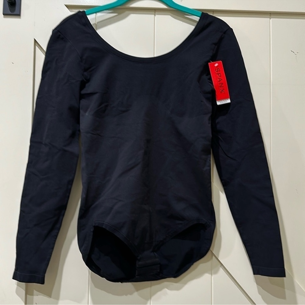 Nwt Spanx long sleeve bodysuit.